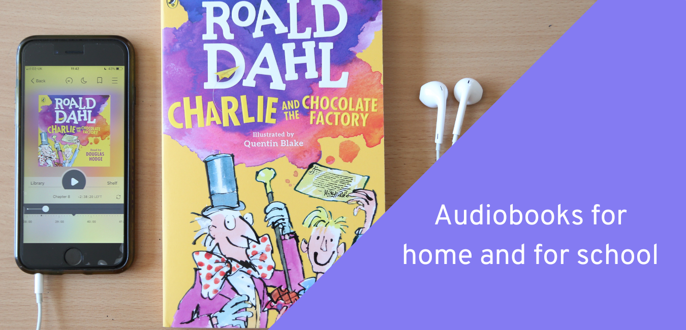 Photo of Roald Dahl's Charlie and the Chocolate Factory book next to a phone and earphones. Right of image is a purple triangle. Text reads Audiobooks for home and for school.