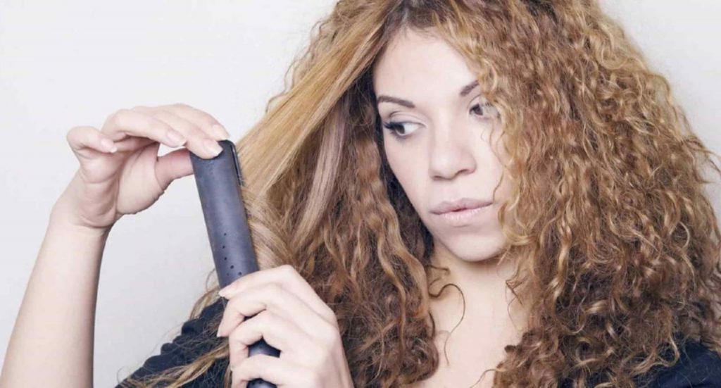 prep curly hair for straightening